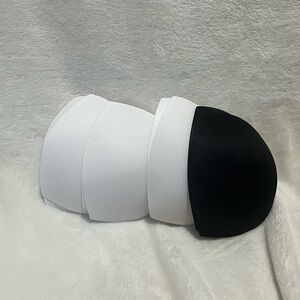 4 Pairs bra liners, new.